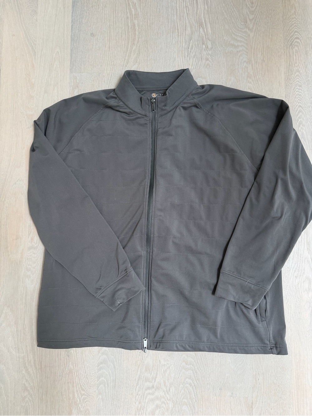STITCH Weather System Black Zip Up jacket with Orange Logo